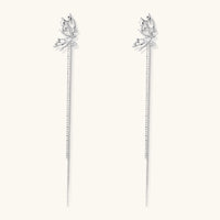 Silver-toned threader earrings featuring detailed fairy figure with wings and dual delicate chain strands, zirconia accents